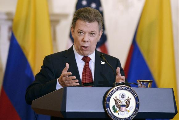 Colômbia - Na Colômbia, o presidente Juan Manuel Santos e o comandante das Forças Armadas Revolucionárias da Colômbia (Farc), Rodrigo Echeverri, o "Timochenko", am no dia 24 de novembro, em Bogotá, um acord